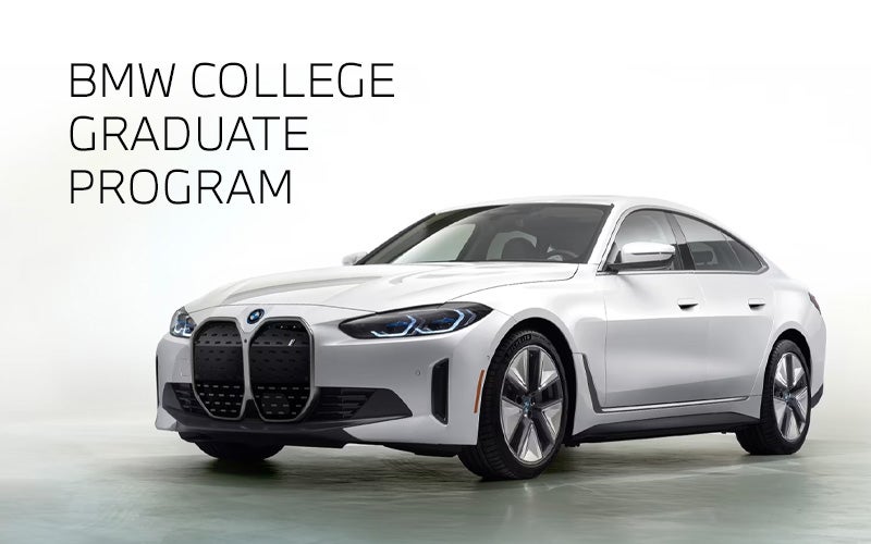 White BMW i4 parked. BMW College Graduate Program. | BMW of Temple in Temple TX